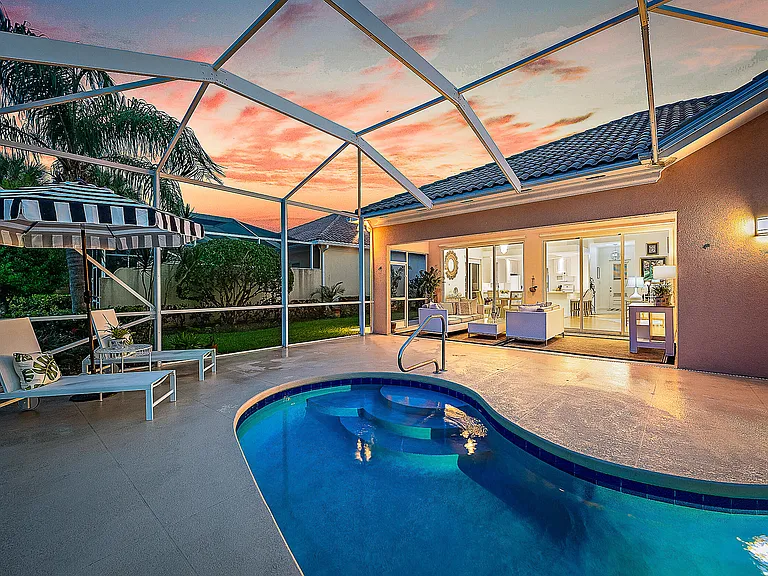 Port St. Lucie home with large screened-in patio