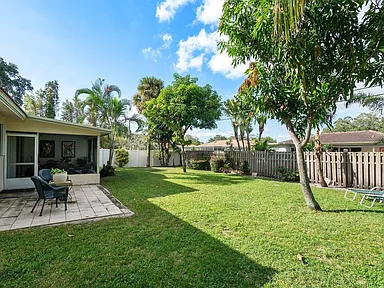 Walk-in shower with glass door in Port St. Lucie home