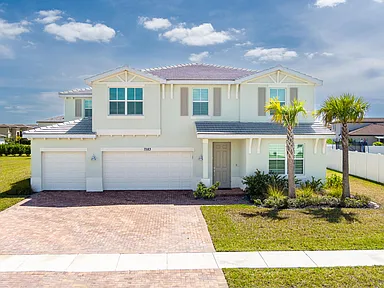 Port Saint Lucie home with large fenced backyard