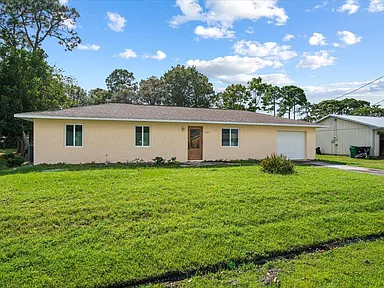 Florida room in Port St. Lucie with tile floors and windows