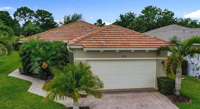 Modern bathroom with double vanity and walk-in shower in Saint Lucie